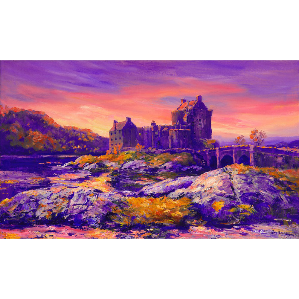 A dramatic sunset highlights this famous castle on the West Coast of Scotland. 